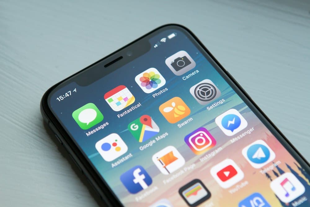 Phone showing apps for the branded client portal